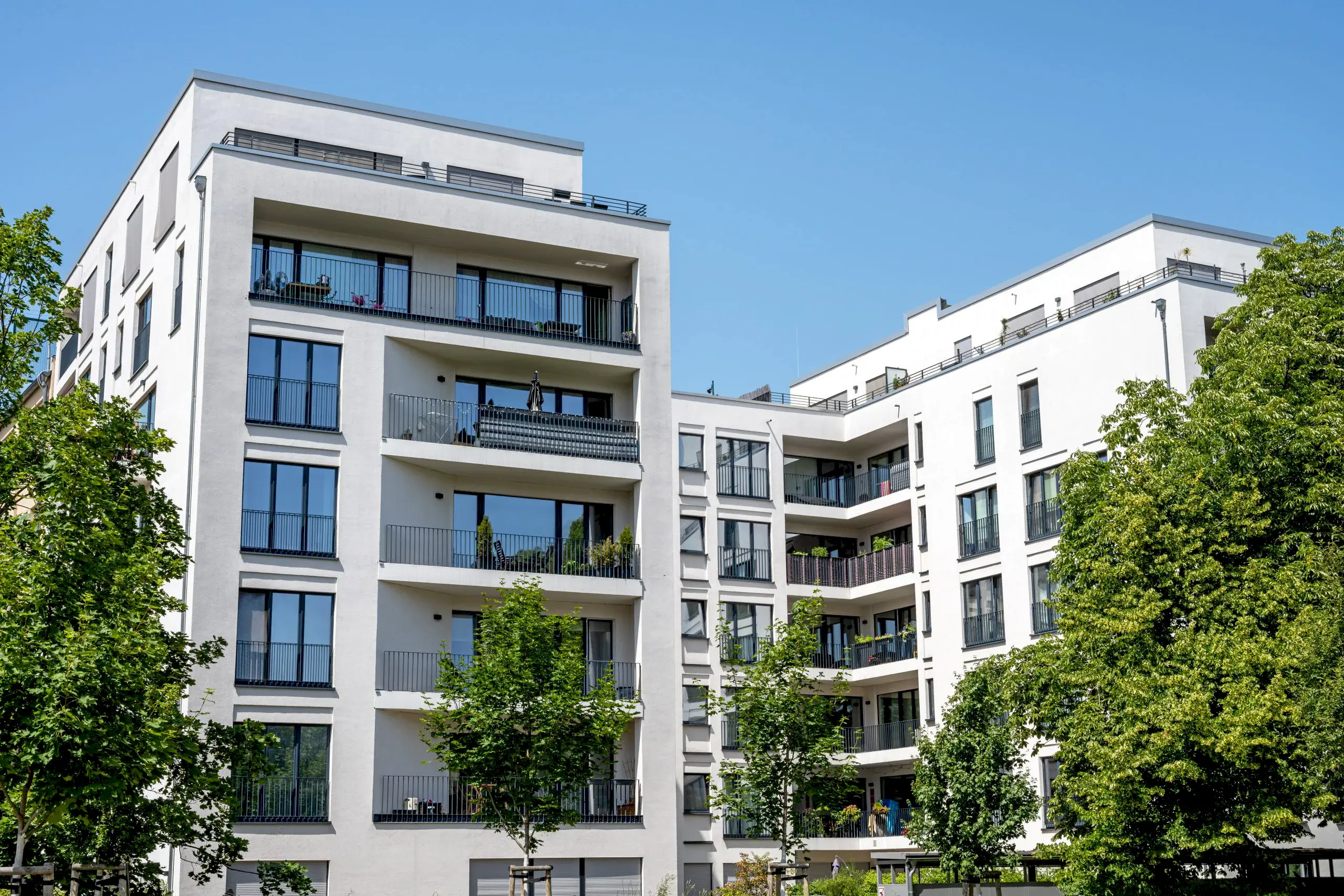 Modern white residential building seen in Berlin, Germany